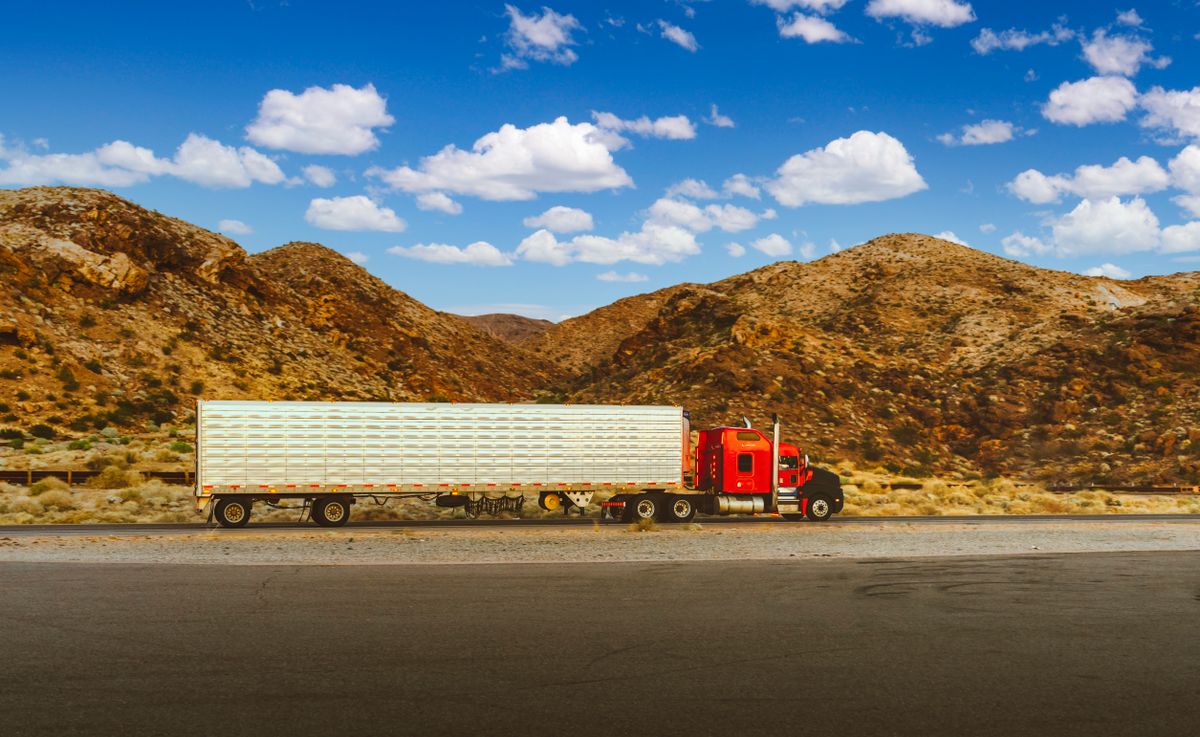 Semi truck pulling freight on the interstate