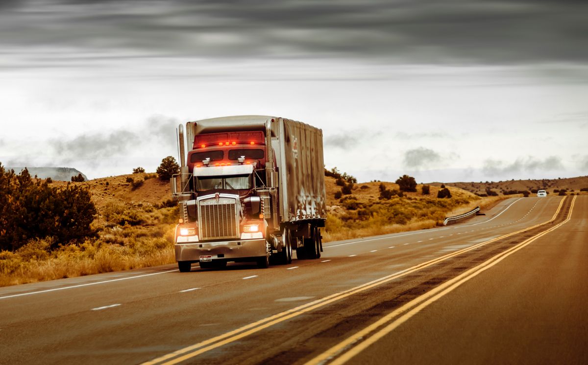 Volvo semi truck parked roadside